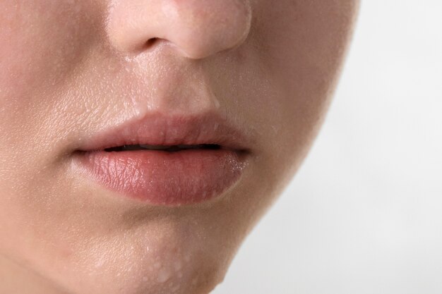 Close up portrait of woman with hydrated skin