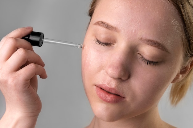 Close up portrait of woman with hydrated skin