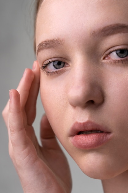 Close up portrait of woman with hydrated skin