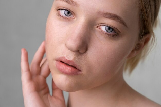 Close up portrait of woman with hydrated skin