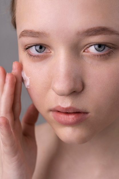 Close up portrait of woman with hydrated skin