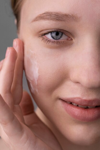 Close up portrait of woman with hydrated skin