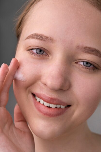 Close up on portrait of woman with hydrated skin