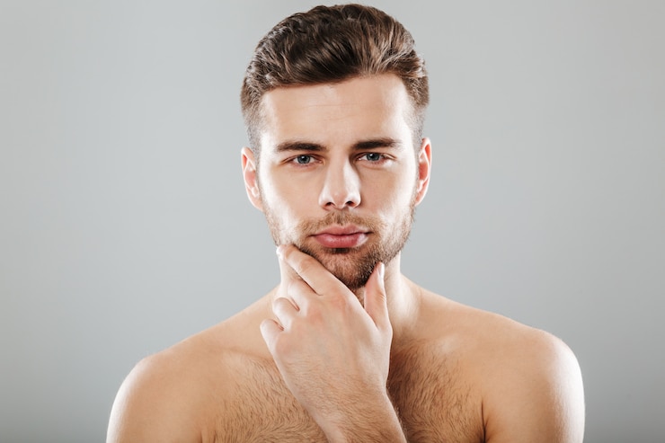 Free Photo close up portrait of a young bearded man