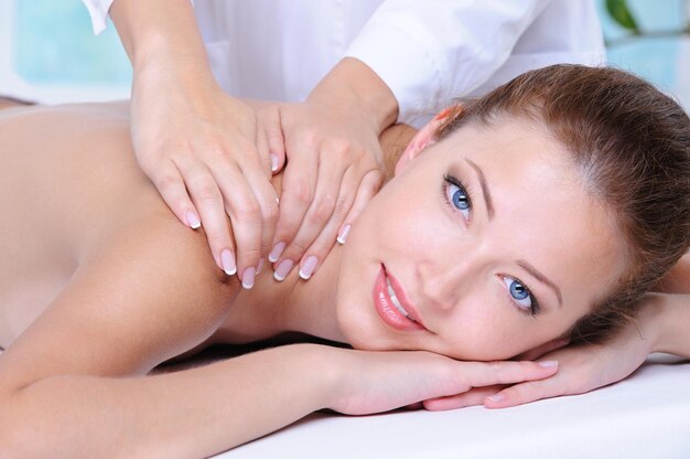 Close-up portrait of young beautiful woman relaxing in the beauty salon