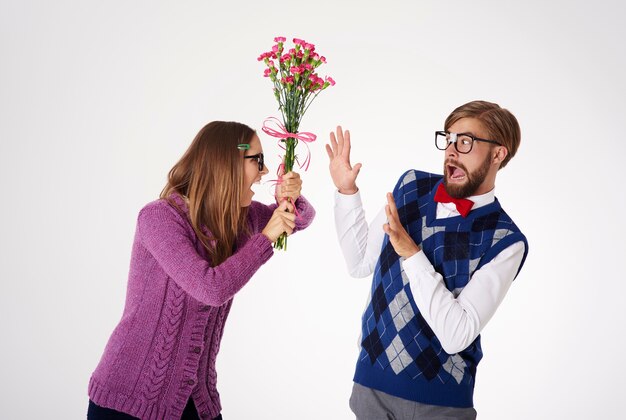 Close up portrait of young couple having a fight