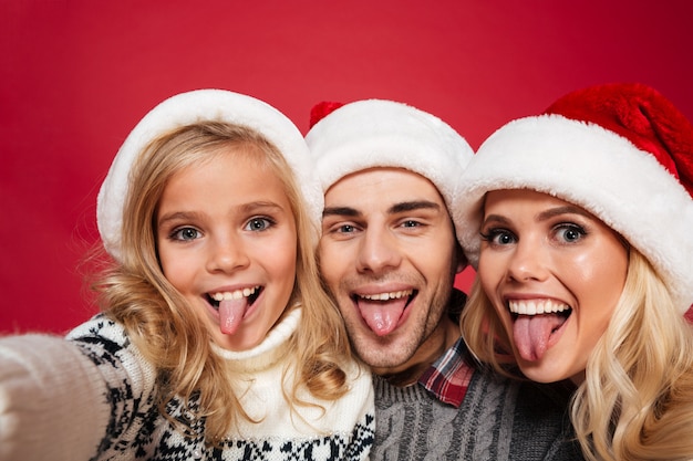 Close up portrait of a young family with a child