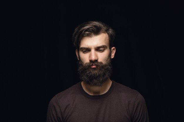 Close up portrait of young man isolated