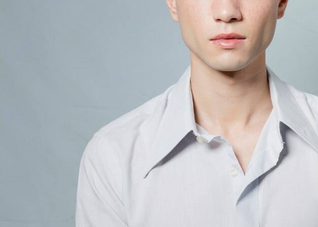 Close-up of posing man in shirt