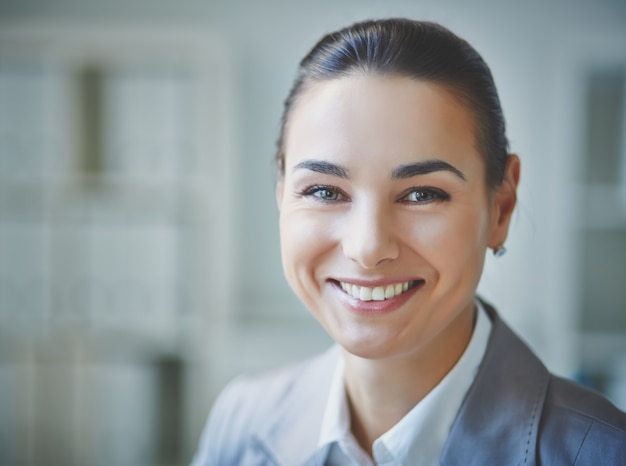 Close-up of positive executive at work