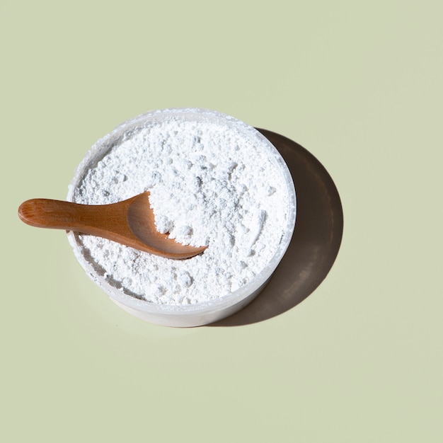 Close-up of a powder bowl on plain background