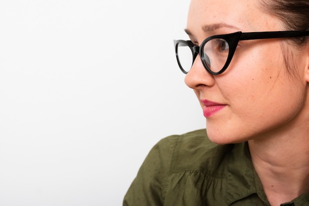 Close-up pretty young woman with glasses