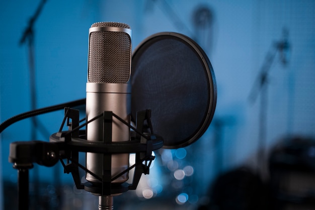 Free photo close up professional microphone and pop filter