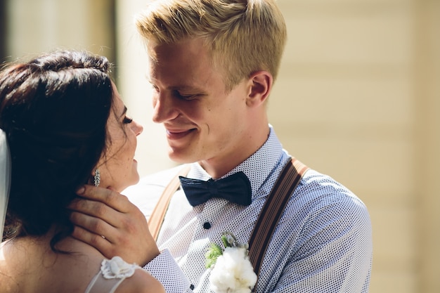 Close-up of proud groom smiling