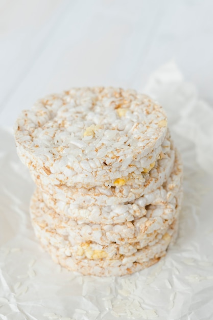 Close-up of puffed rice cakes on parchment paper