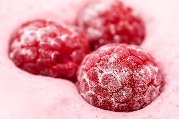 Close-up raspberries in delicious smoothie