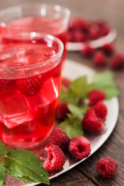 Close-up of raspberry cocktails with mint