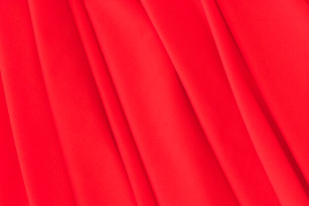 Крупным планом красный складной фон ткани