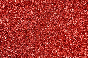 Close up of red glitter textured background