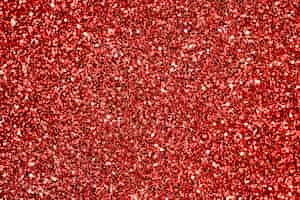 Free photo close up of red glitter textured background