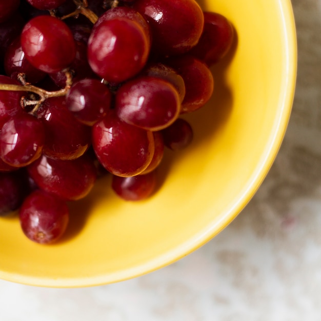 Close up red grapes in bowl