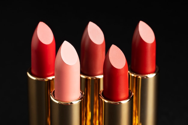 Free photo close up red lipsticks arrangement