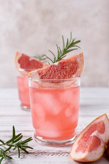 Close-up refreshing alcoholic drink with grapefruit