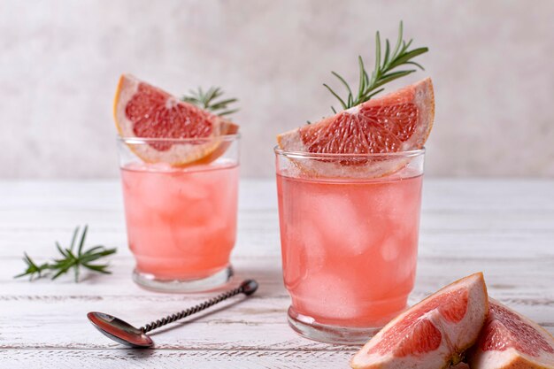 Close-up refreshing alcoholic drink with grapefruit