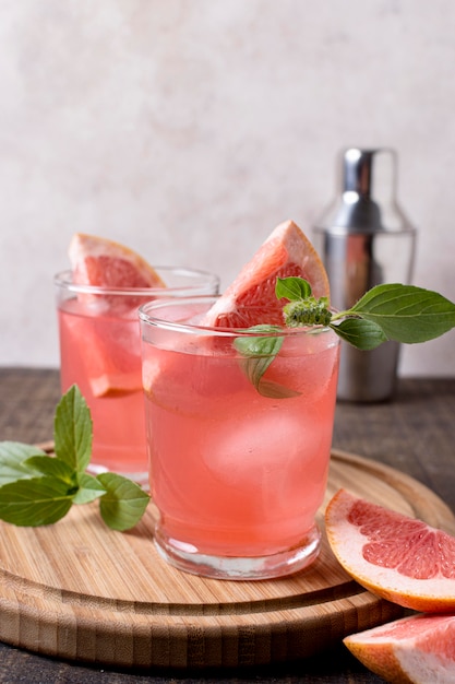 Close-up refreshing alcoholic drink with grapefruit