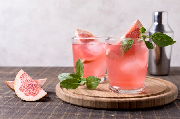 Close-up refreshing alcoholic drink with grapefruit