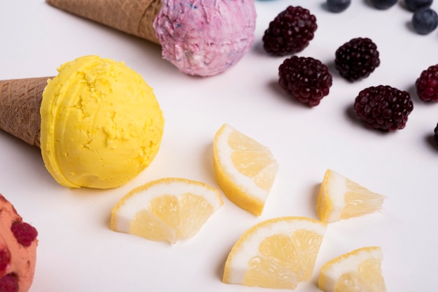 Close-up refreshing ice cream with lemon slices