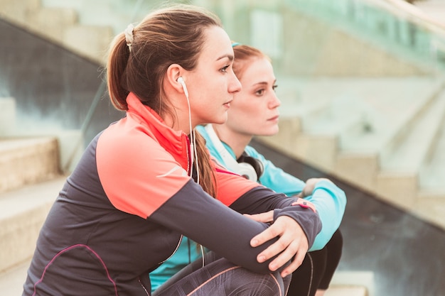 Close-up of relaxed sportswomen