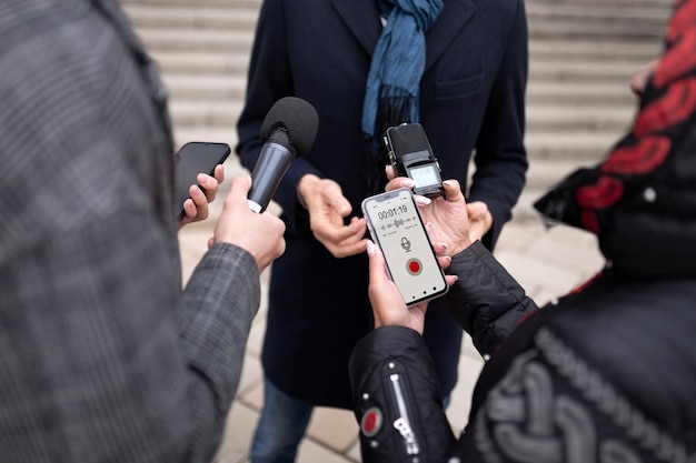 Free photo close up on reporter taking an interview