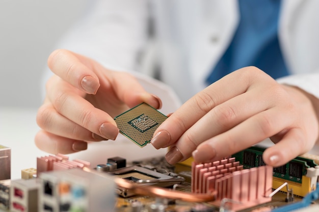 Close up researcher holding chip