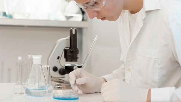 Close-up researcher in lab