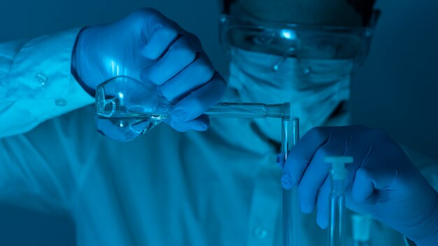 Close-up researcher working in lab