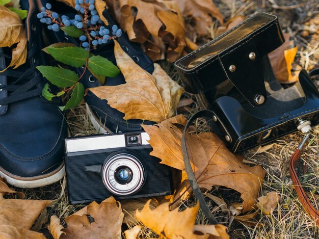 Close-up of a retro photo camera on ground