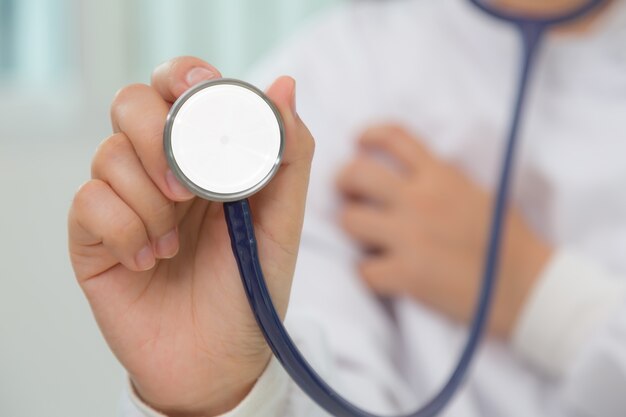 Close-up of right hand with stethoscope