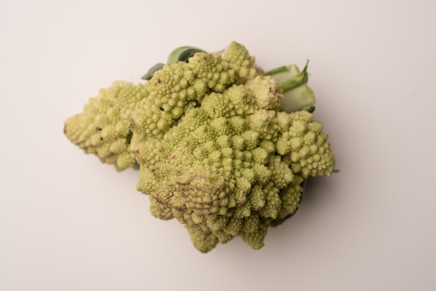 Close up of a ripe cauliflower isolated over white