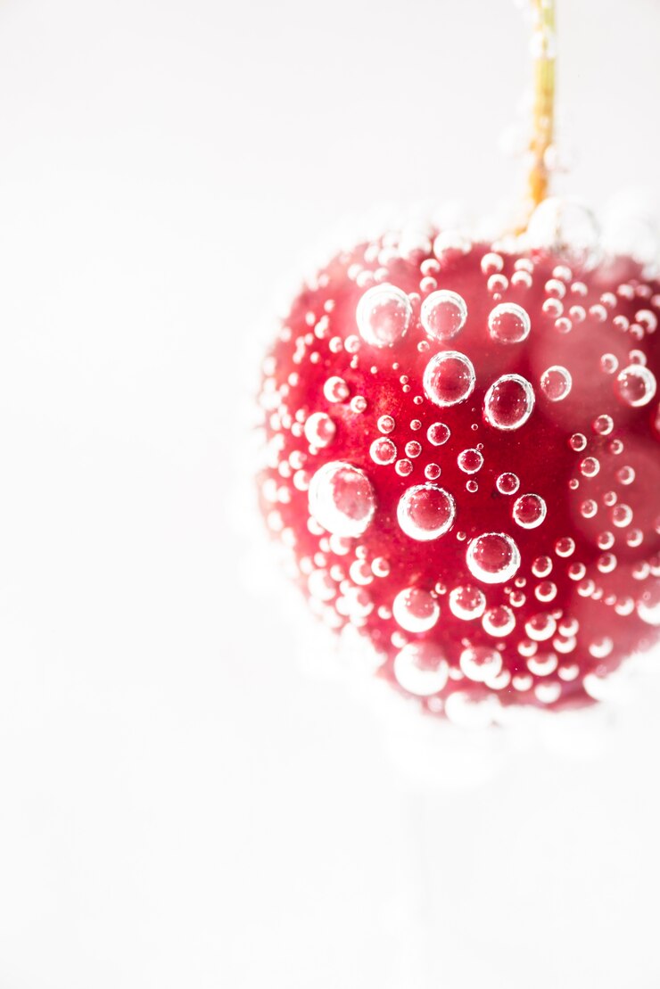 Free Photo close-up ripe fresh red cherry with water