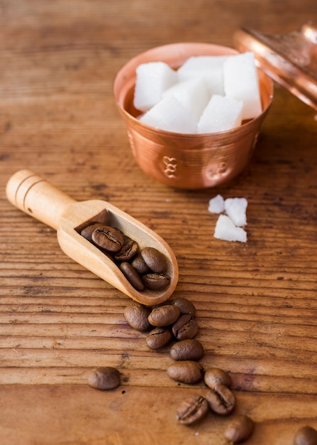 Close-up roasted coffee beans with sugar