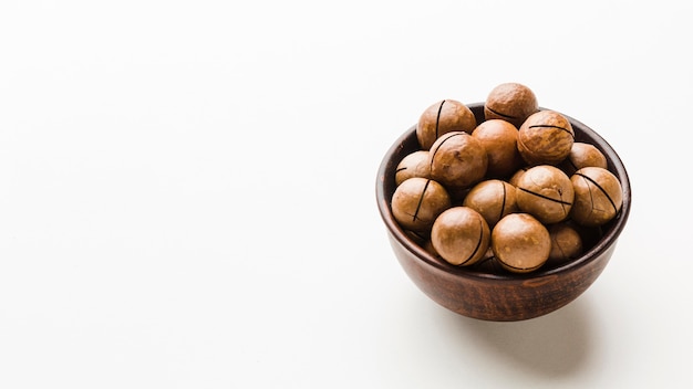 Close-up roasted hazelnuts in a bowl