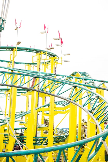 Close-up of roller coaster rail at amusement park