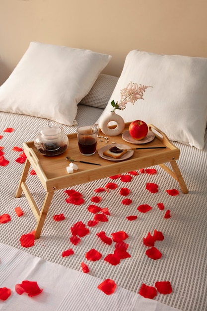 Close up on romantic breakfast in bed arrangement