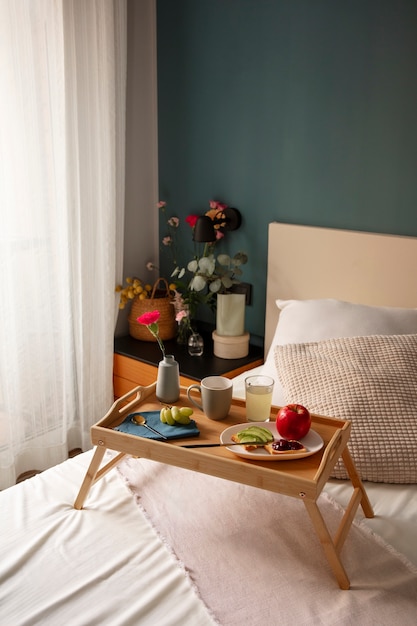 Close up on romantic breakfast in bed arrangement