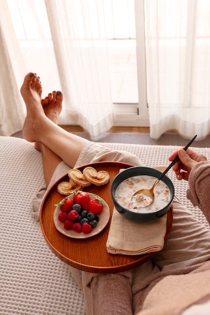 Close up on romantic breakfast in bed arrangement