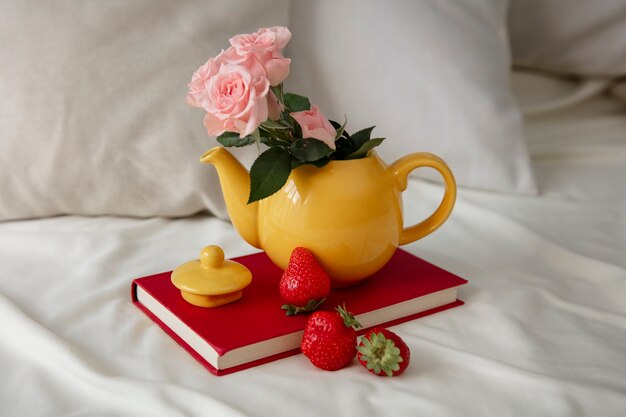 Close up on romantic breakfast bed arrangement