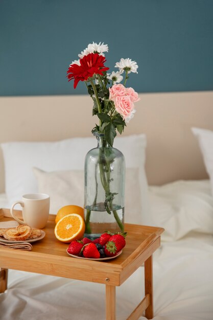 Close up on romantic breakfast bed arrangement