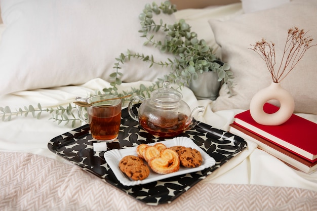 Close up on romantic breakfast bed arrangement