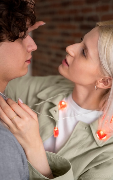 Close up romantic couple with lights